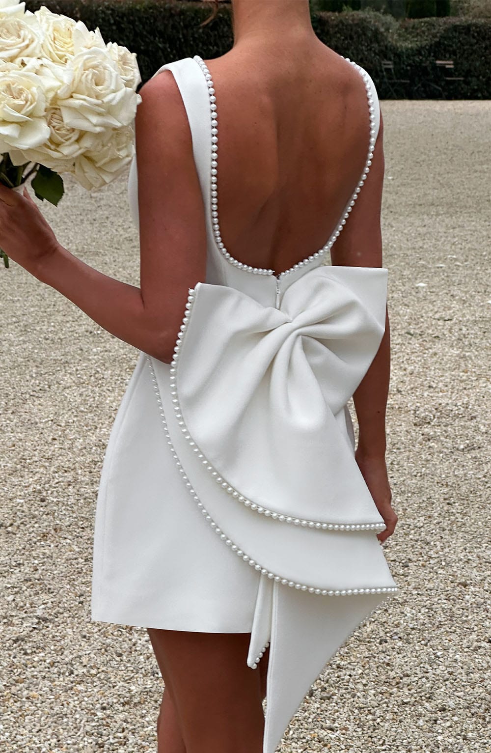Robe de cocktail courte sans manches pour femme