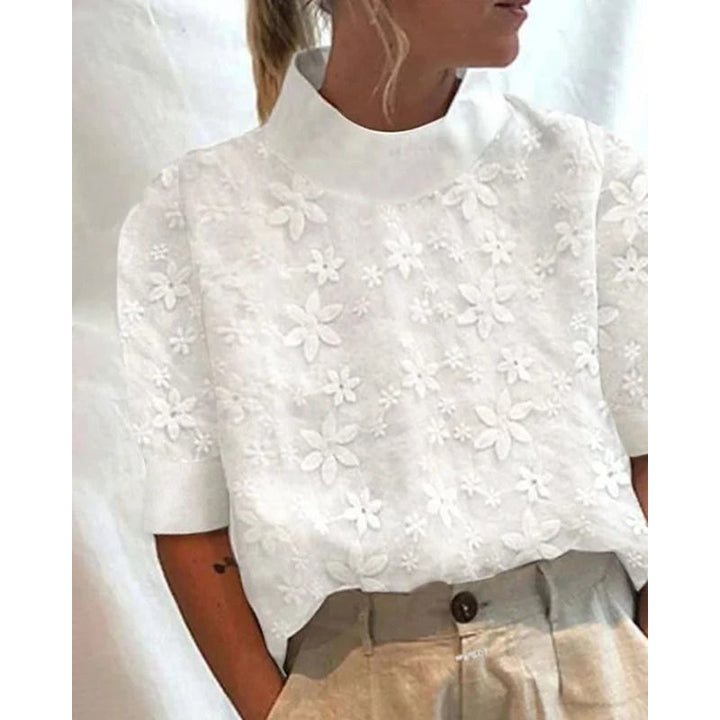 Bestickte Bluse mit Stehkragen und floralem Detail in lockerer Passform