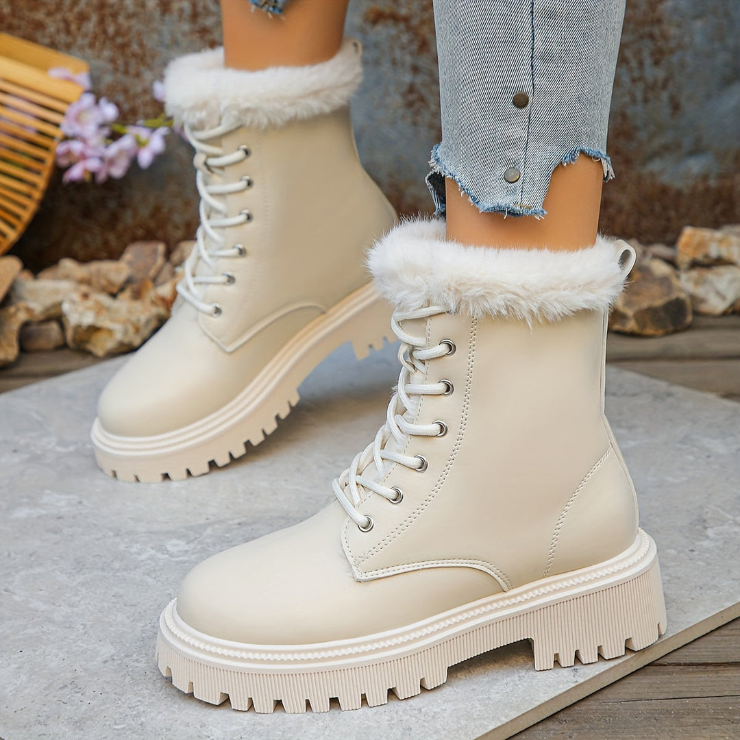 Damen Winterstiefeletten mit dicker Sohle und Kunstfellfutter zum Schnüren