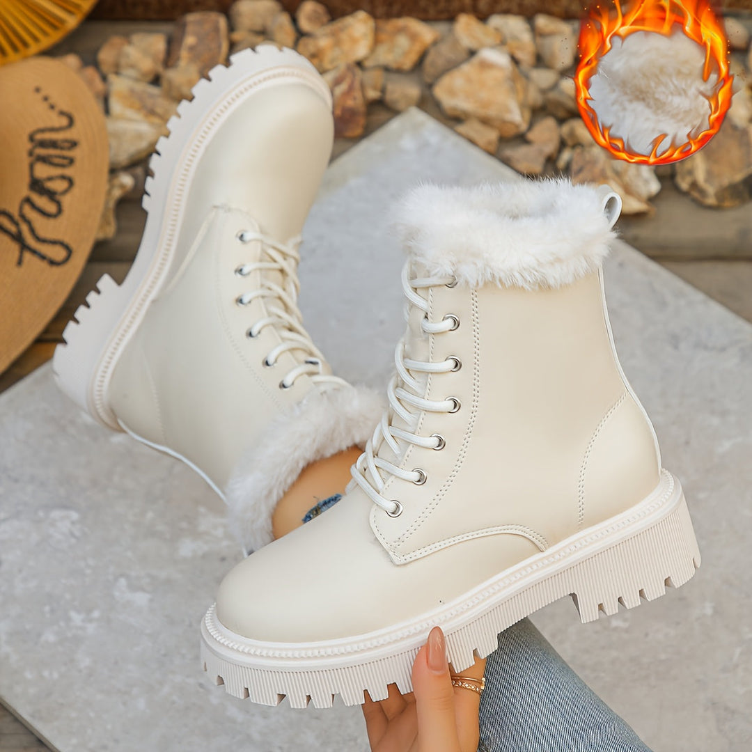 Damen Winterstiefeletten mit dicker Sohle und Kunstfellfutter zum Schnüren