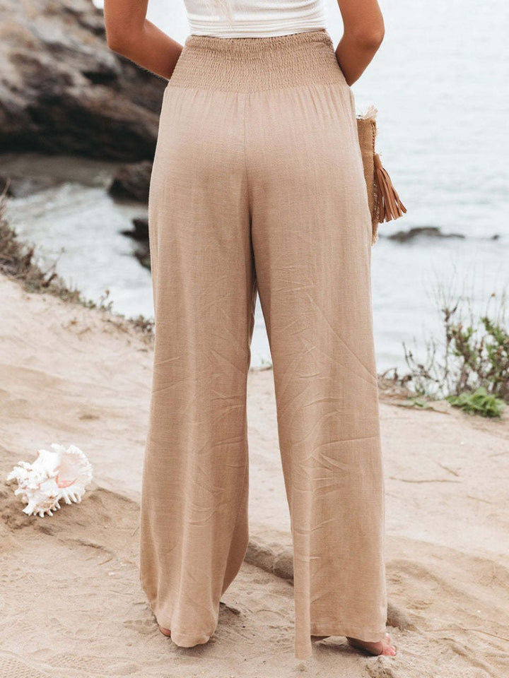 Entspannte Leinenhose mit weitem Bein und gerafftem Bund