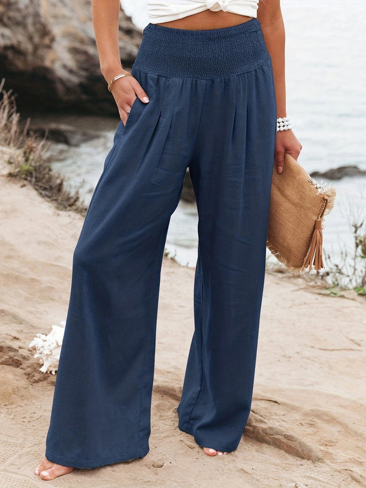 Entspannte Leinenhose mit weitem Bein und gerafftem Bund