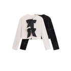 Amelia – Vielseitige kurze Jacke mit Schleifendekoration und Pailletten
