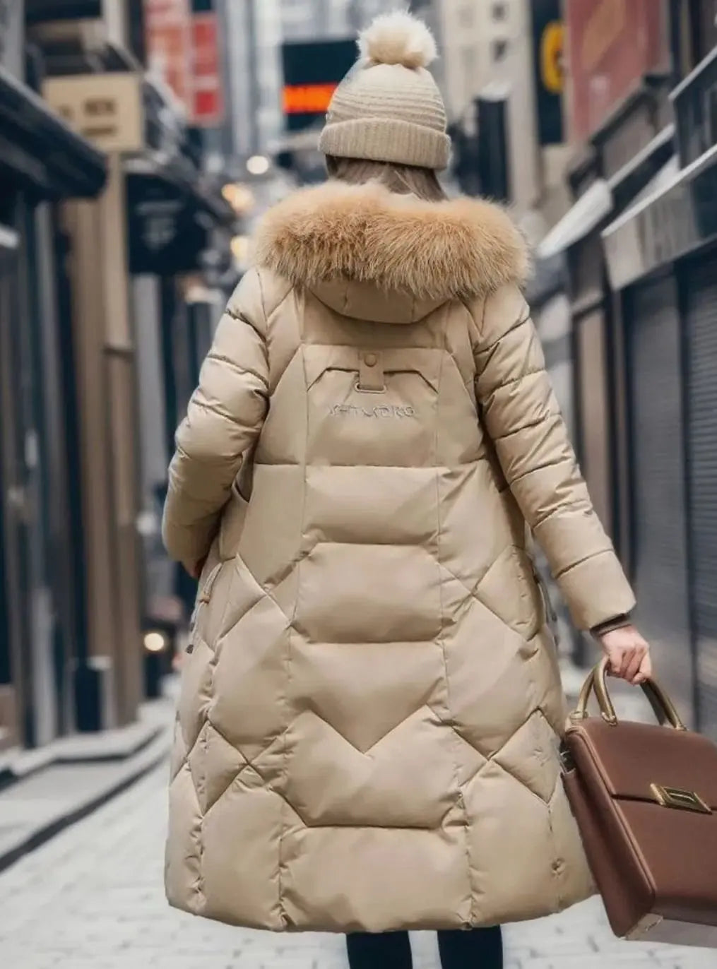 Lily | Damen Lange Kapuzenjacke mit Kunstfellbesatz und Steppung